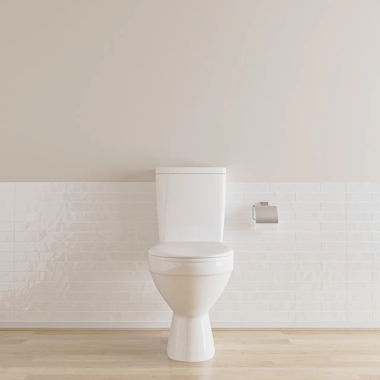 A two-piece toilet against a white tiled wall above an oak floor