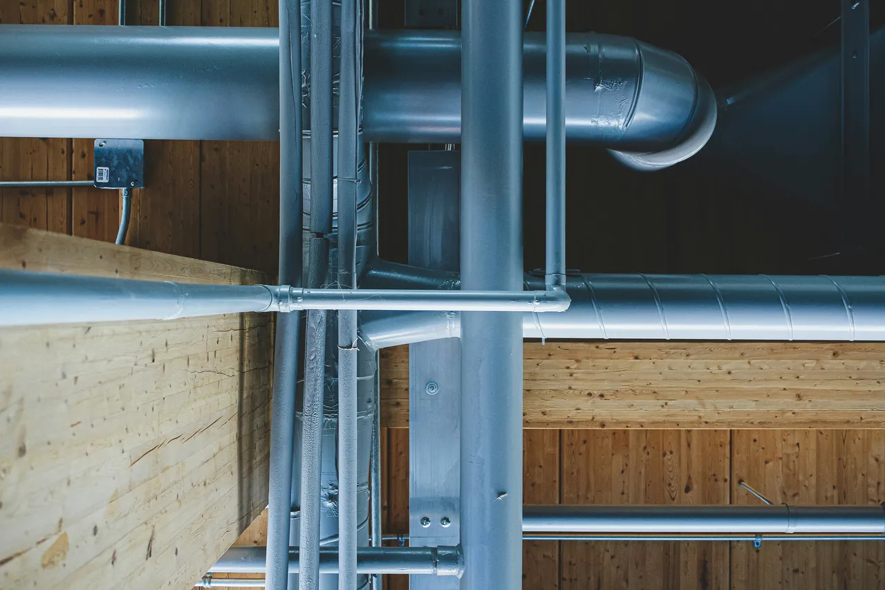 Water supply lines running through a framed ceiling