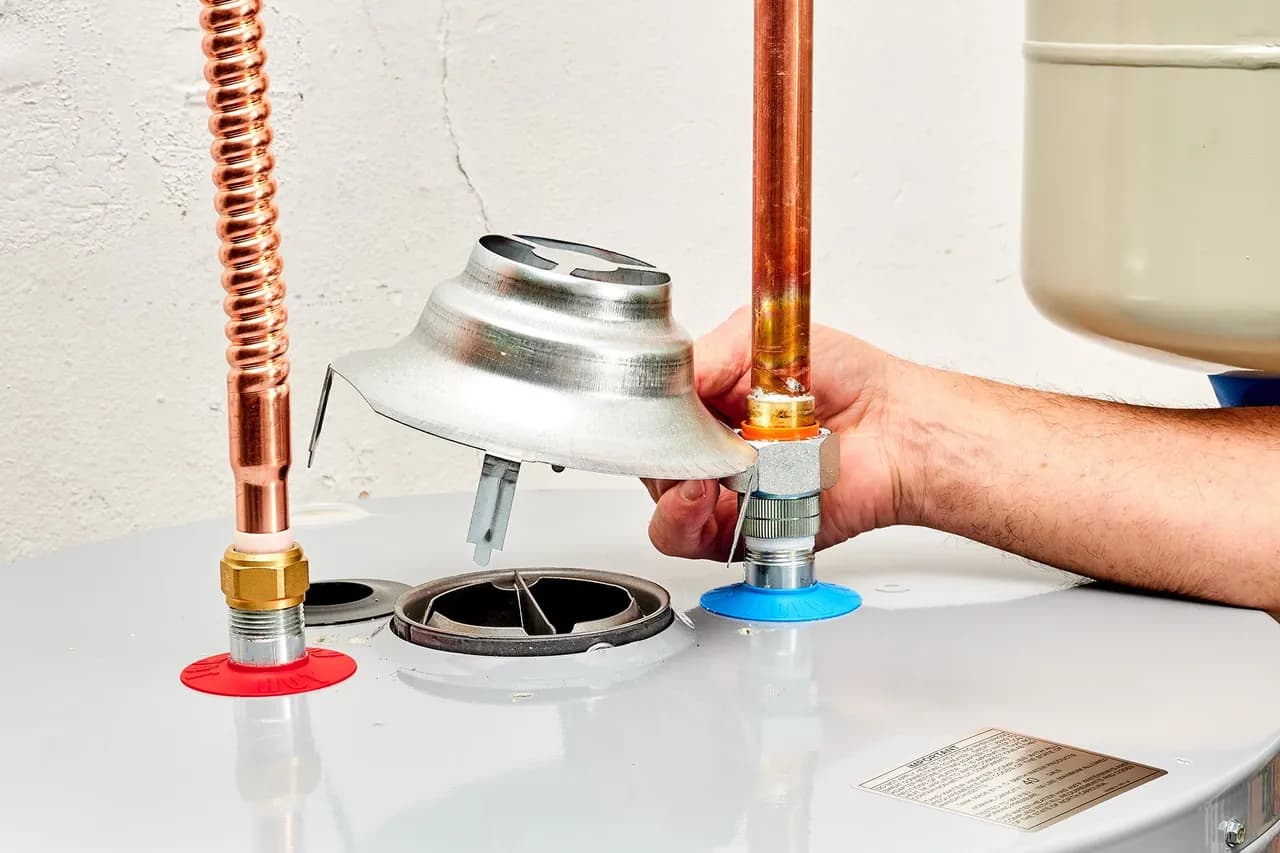 Copper supply connections being made up by hand